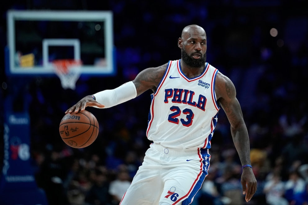 LeBron James in Philadelphia 76ers blue uniform during October 2026 preseason action