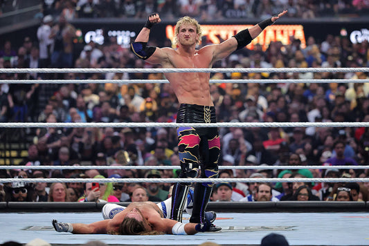 Logan Paul flexing his muscular chest, shoulders and arms in the WWE WrestleMania 42 ring