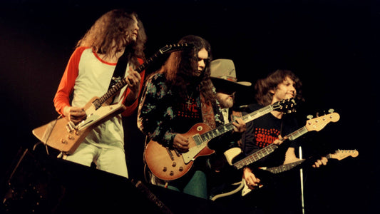 Lynyrd Skynyrd performing live during their classic 1970s era, illustrating a Southern-rock strength-training song ranking