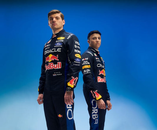 Max Verstappen and Isack Hadjar wearing Red Bull Racing's standard 2026 race suits
