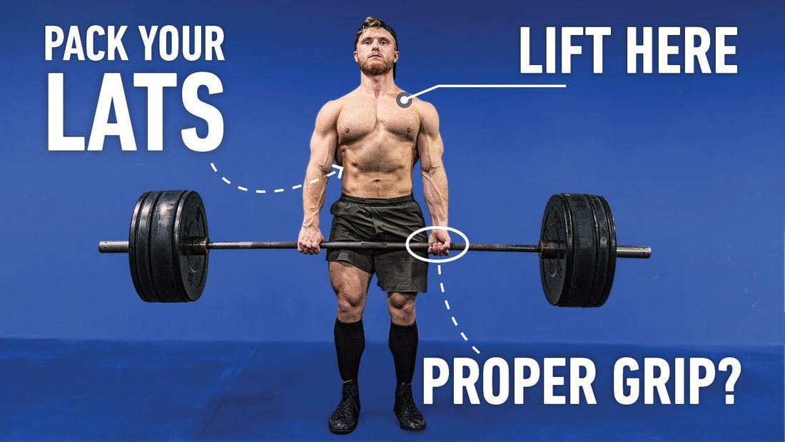 Jeff Nippard performing a conventional deadlift with a loaded barbell