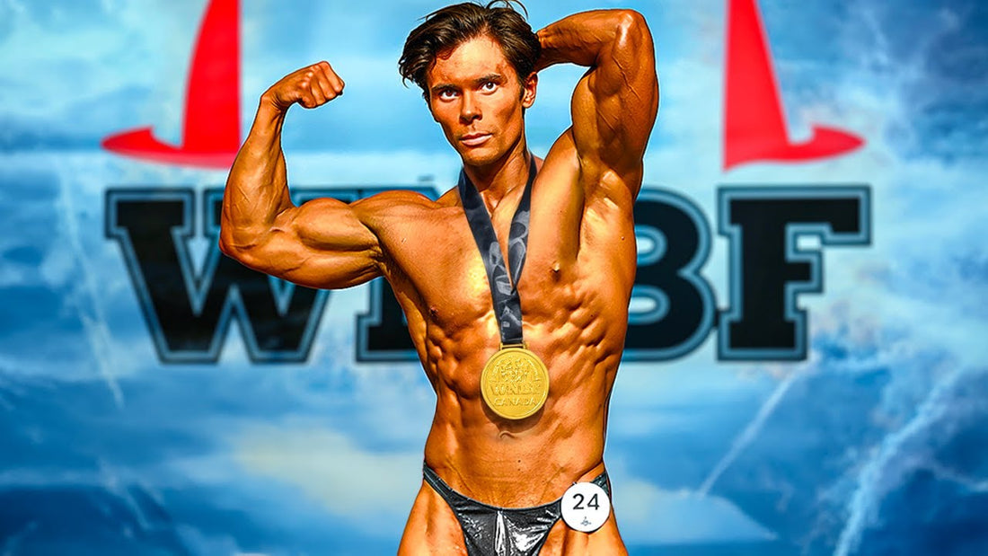 Will Tennyson flexing in a bodybuilding contest pose with a medal around his neck against a WNBF stage backdrop