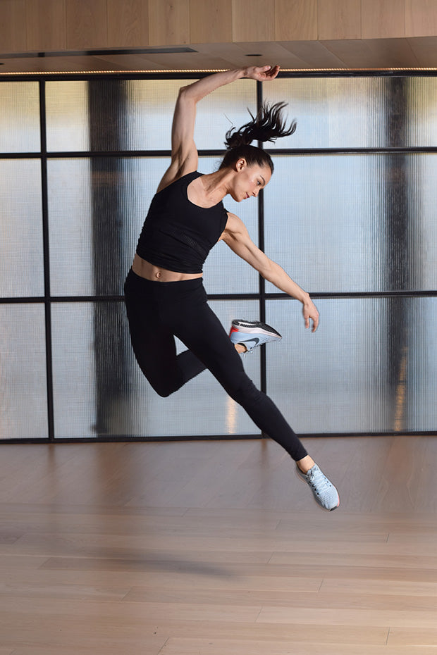 Megan Roup performing a dynamic dance-inspired fitness workout