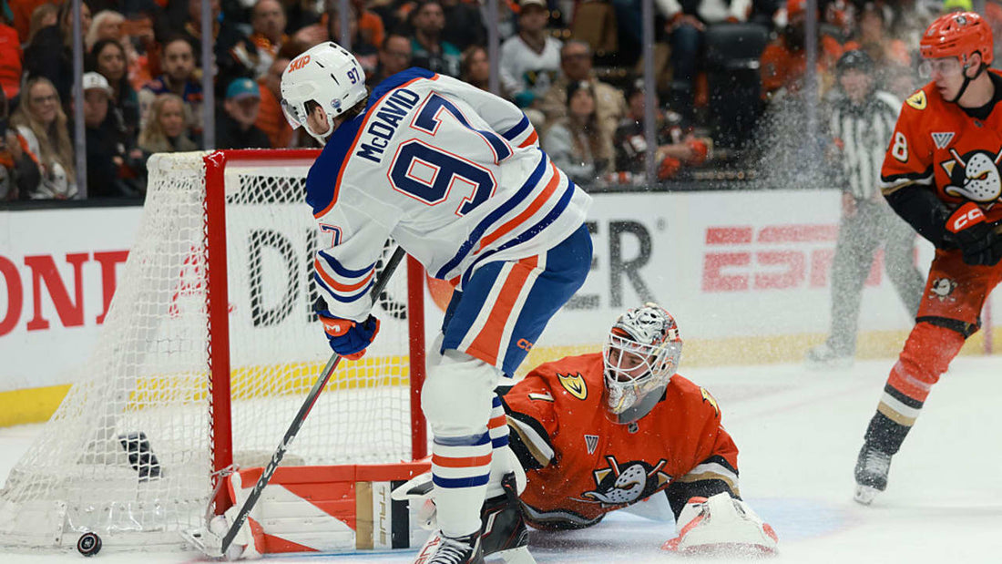 Connor McDavid wearing Edmonton Oilers blue and orange while attacking Anaheim during the 2026 playoffs