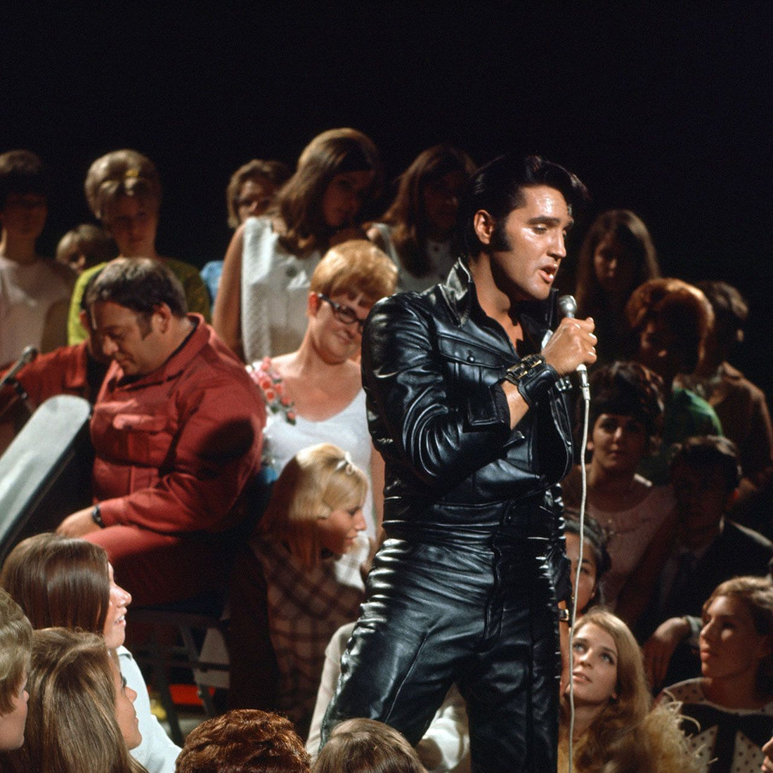 Elvis Presley performing in black leather during his 1968 comeback television special