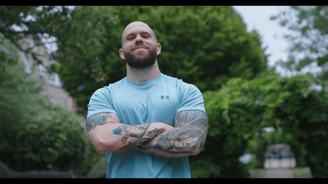 Dr. Pak in a gym, the strength scientist and coach known for minimum effective dose training