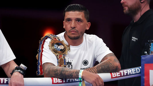 Lee Selby standing in a boxing ring with a championship belt over his shoulder ahead of his bare-knuckle return