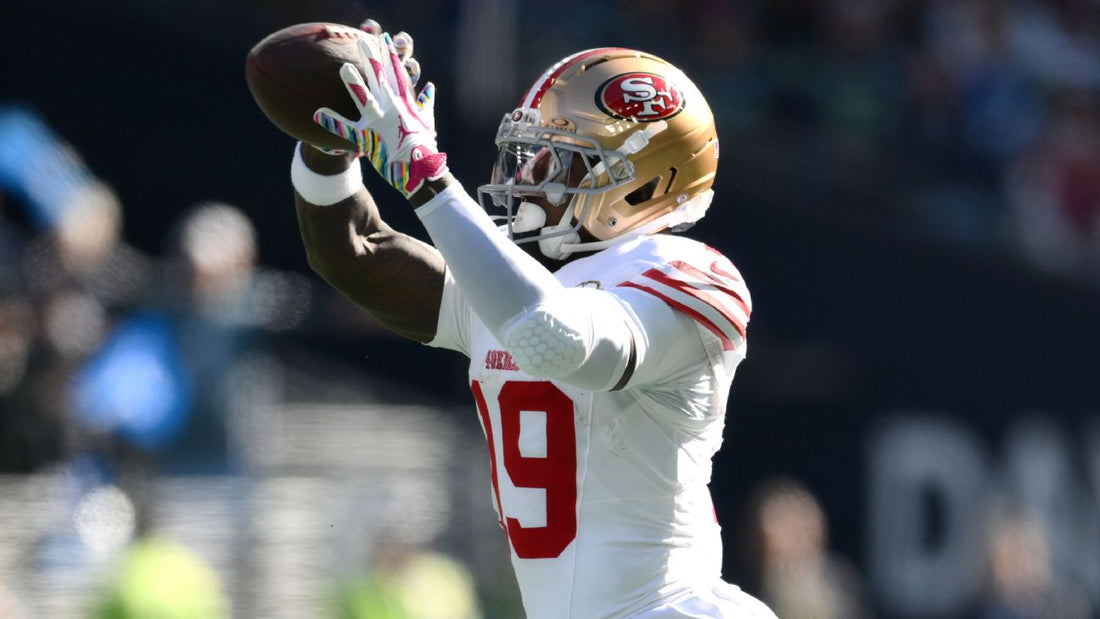 Deebo Samuel catches a football in a San Francisco 49ers uniform in 2026
