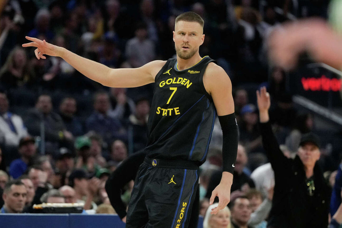 Kristaps Porziņģis in the Golden State Warriors' black No. 7 uniform during February 2026