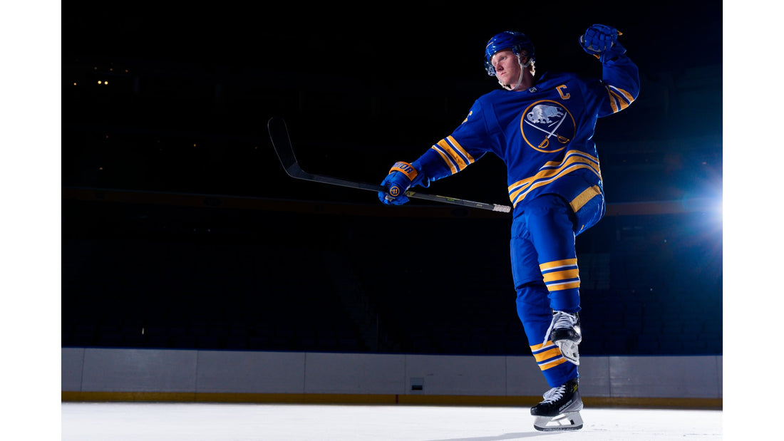 Rasmus Dahlin in a Buffalo Sabres captain's jersey