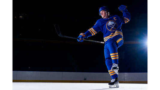 Rasmus Dahlin in a Buffalo Sabres captain's jersey
