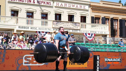 Trey Mitchell performing a heavy deadlift on the outdoor 2025 World's Strongest Man competition platform