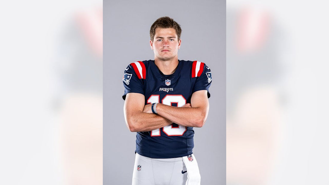 Drake Maye in New England Patriots 2026 uniform during official team photo day