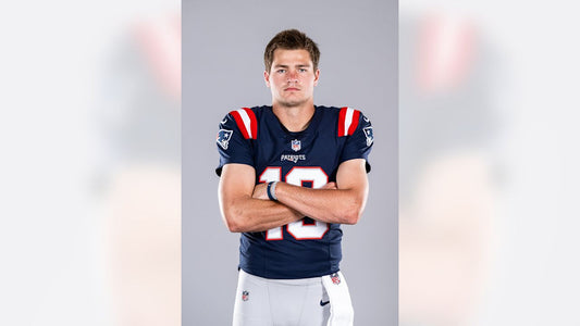 Drake Maye in New England Patriots 2026 uniform during official team photo day