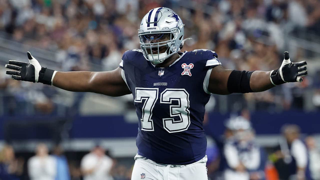 Tyler Smith wearing number 73 for the Dallas Cowboys in a navy uniform