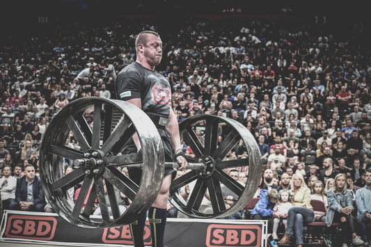 Adam Bishop competing on a wheel deadlift at Giants Live