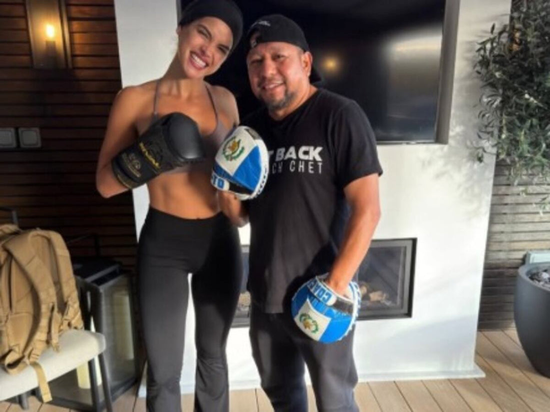 Adria Arjona in boxing gloves after a training session