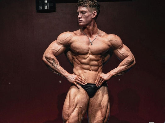 Anton Ratushnyi posing in Classic Physique condition