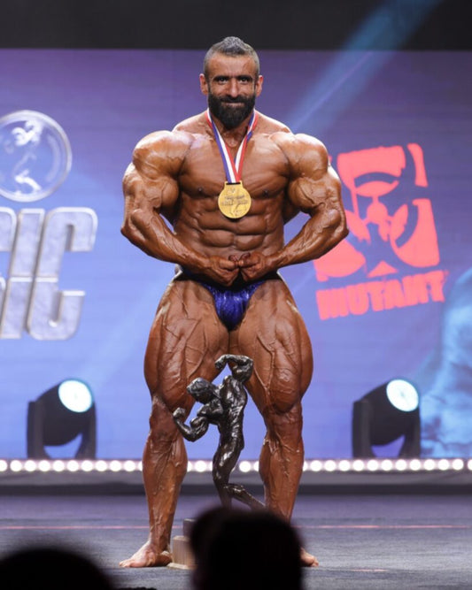 Hadi Choopan displaying his physique after winning the Arnold Classic