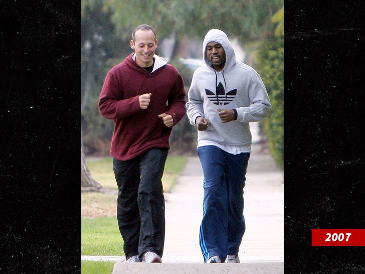 Kanye West jogging with trainer Harley Pasternak