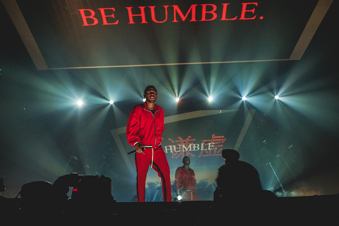 Kendrick Lamar performing on stage