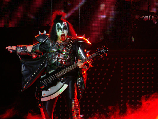 Gene Simmons performing live with KISS for a heavy lifting playlist