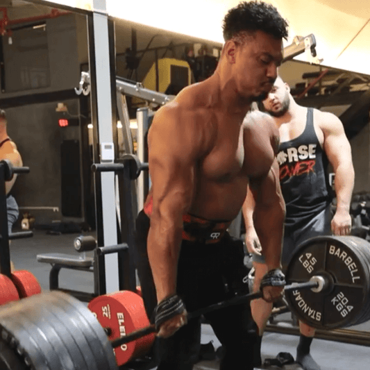 Larry Wheels performing a heavy deadlift