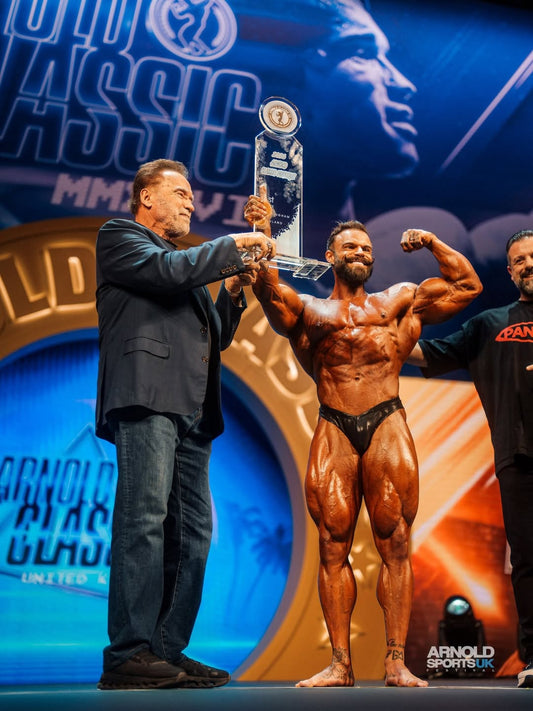 Mike Sommerfeld posing after winning the 2026 Arnold Classic UK