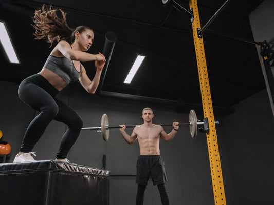 Athlete front squatting in a strength and conditioning gym