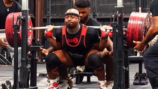 Russel Orhii performing a very heavy raw squat in training