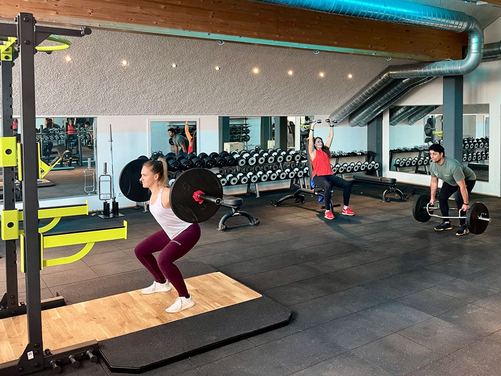 Strength training gym with squat, press and deadlift movements