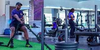 Abraham Omala training for HYROX-style fitness in a Nairobi gym