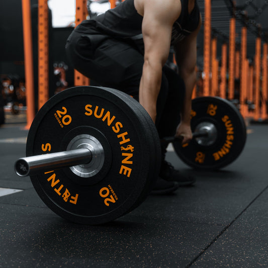 Close-up of real barbell weight plates in a gym