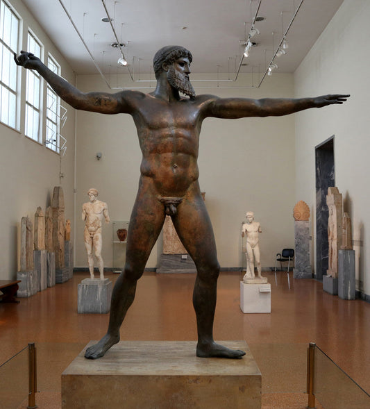 Artemision bronze commonly identified as Zeus in a museum gallery
