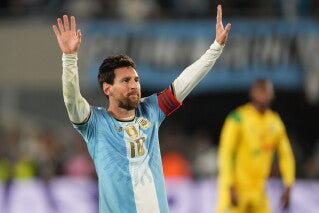 Lionel Messi saluting Argentina supporters during his final international match
