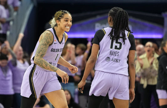 Gabby Williams celebrates with teammate Tiffany Hayes during the Golden State Valkyries' 2026 playoff run