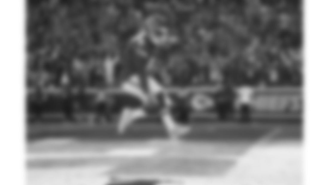 Kenneth Walker III leaps for a touchdown against the Chargers on October 18, 2026