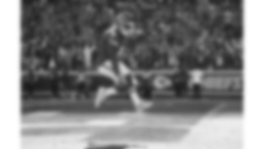Kenneth Walker III leaps for a touchdown against the Chargers on October 18, 2026