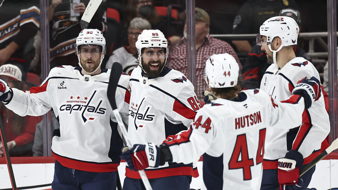 Alex Tuch celebrates with Washington Capitals teammates in October 2026