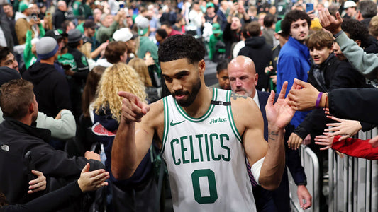 Jayson Tatum celebrates the Boston Celtics' October 27, 2026 overtime win against the Brooklyn Nets