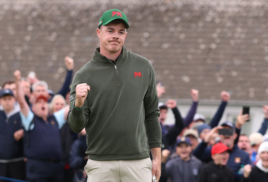 Stuart Grehan celebrating a birdie during the 2026 Walker Cup at Lahinch