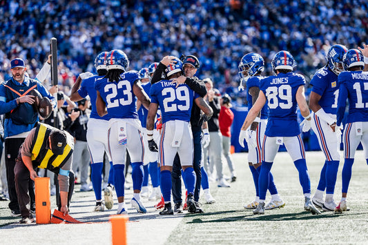 Tyrone Tracy Jr. and coach John Harbaugh with the New York Giants during the 2026 season
