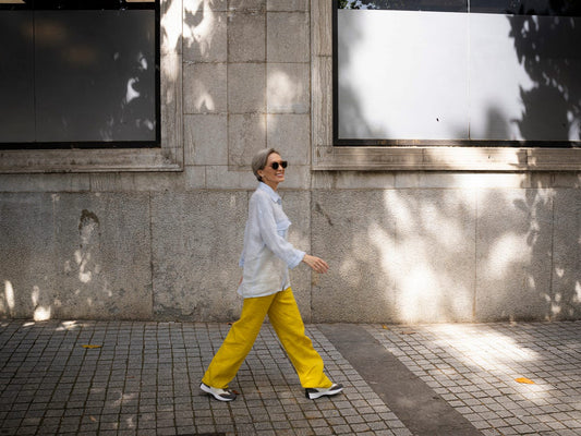Office worker walking through a corridor during a short movement break