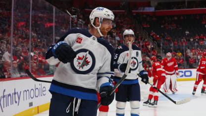 Kyle Connor and the Winnipeg Jets celebrate against Detroit