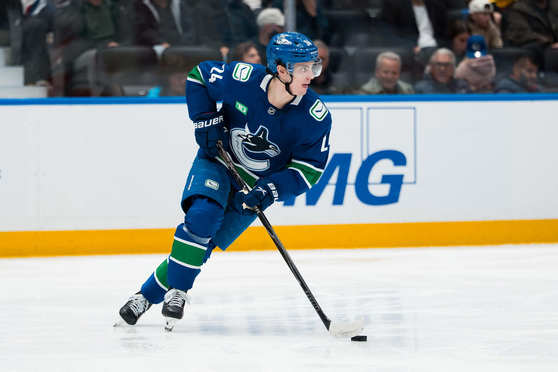 Zeev Buium skating for the Vancouver Canucks after committing long term to the franchise