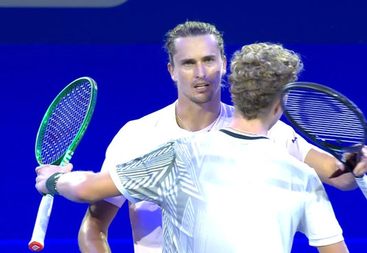 Alexander Zverev and Martin Landaluce embrace at the net after their three-set Vienna Open match on October 27, 2026