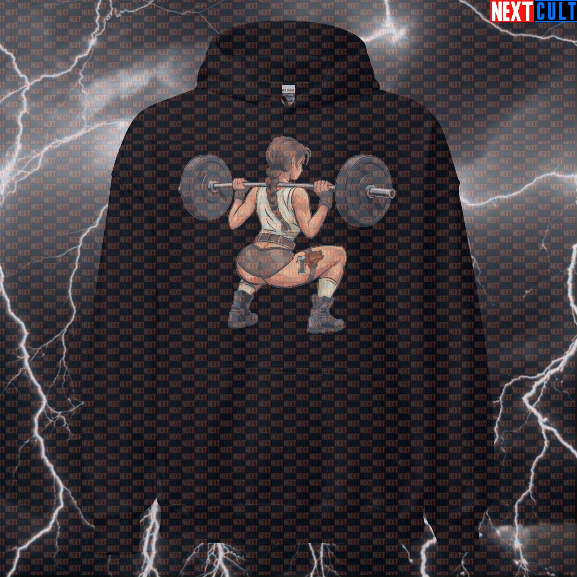 Adventure Girl Gym Hoodie | Funny Booty Builder Workout Hoodie | Leg Day Meme Hooded Sweatshirt Bodybuilding Films Fitness Gym Lara Croft Leg Day Powerlifting Pump Cover Video Games Workout Next Cult Brand